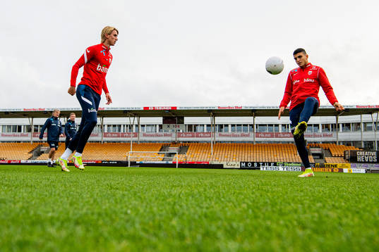 Dennis Johnsen and Mohamed Elyounoussi of the Norwegian