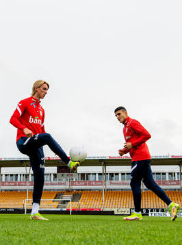 Dennis Johnsen and Mohamed Elyounoussi of the Norwegian