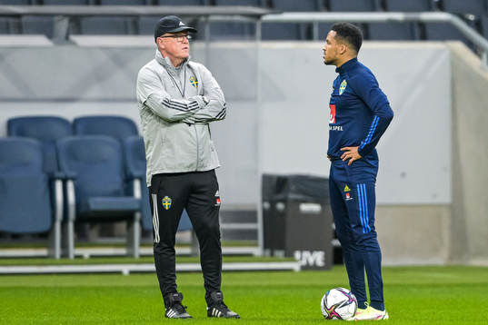 Head coach Janne Andersson and Martin Olsson of the Swedish