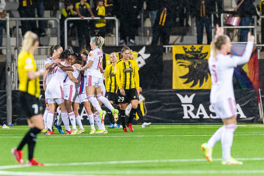 Catarina Macario of Lyon celebrates with team mates