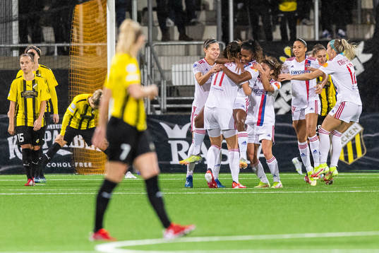 Catarina Macario of Lyon celebrates with team mates