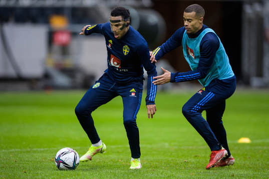 Martin Olsson and Robin Quaison of the Swedish national