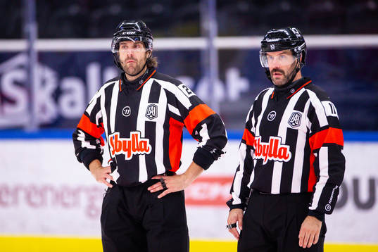 Domare Mikael Sjöqvist (v) och Daniel Wessner (h)