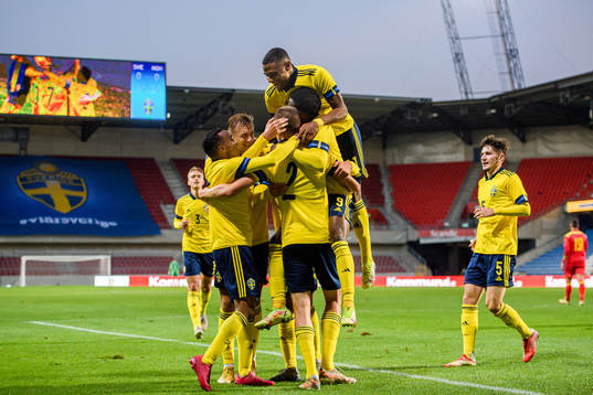 Players of Sweden celebrate with Rami Hajal