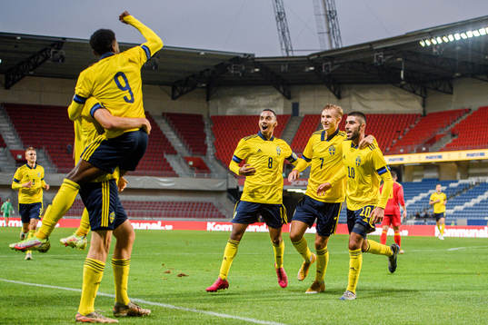 Players of Sweden celebrate with Rami Hajal