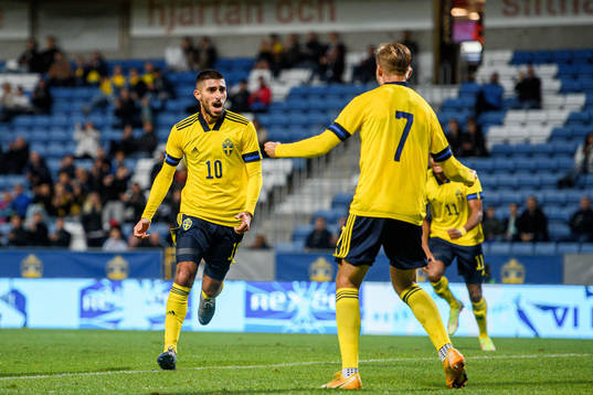 Rami Hajal and Benjamin Nygren of Sweden celebrate the 1-0