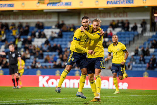 Rami Hajal and Benjamin Nygren of Sweden celebrate the 1-0