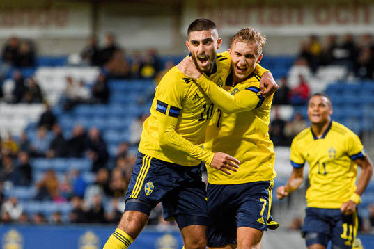 Rami Hajal and Benjamin Nygren of Sweden celebrate the 1-0