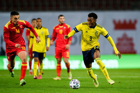 Marko Matanovic of Montenegro and Anthony Elanga of Sweden