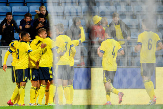Players of Sweden celebrate the 2-0 goal by Armin Gigovic