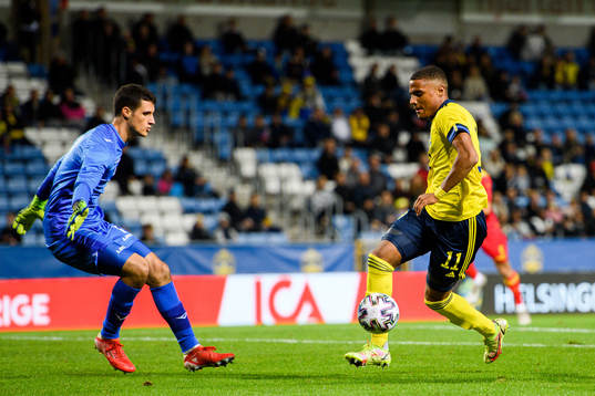 Goalkeeper Nikola Ivezic of Montenegro and Amin Sarr of
