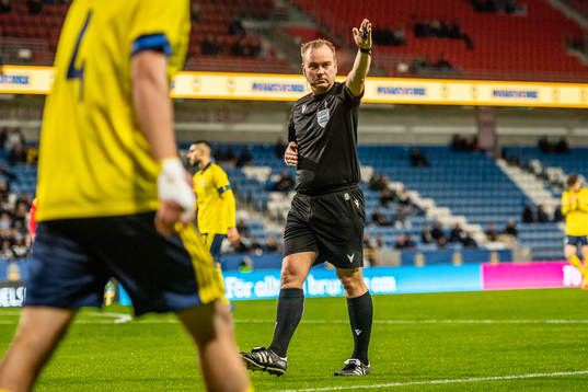 Referee Thorvaldur Arnason