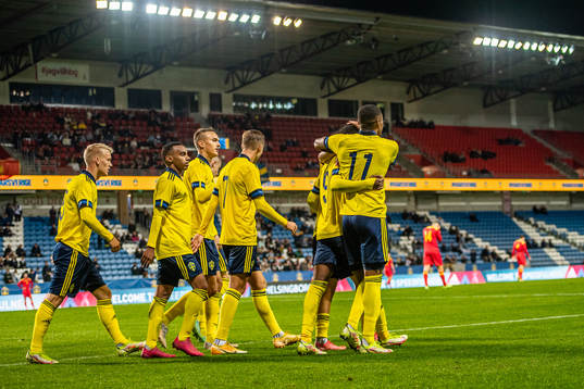 Players of Sweden celebrate