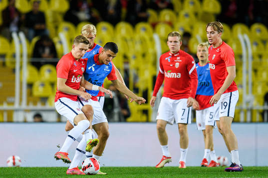 Marcus Holmgren Pedersen and Mohamed Elyounoussi of Norway