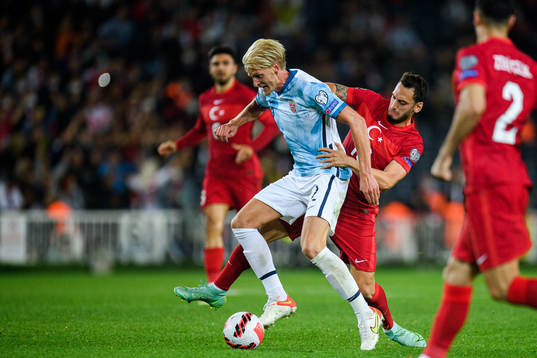 Morten Thorsby of Norway and Hakan Calhanoglu of Turkey