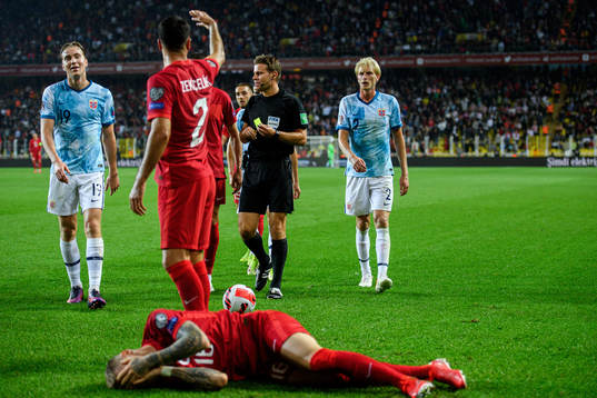Morten Thorsby of Norway receives a yellow card