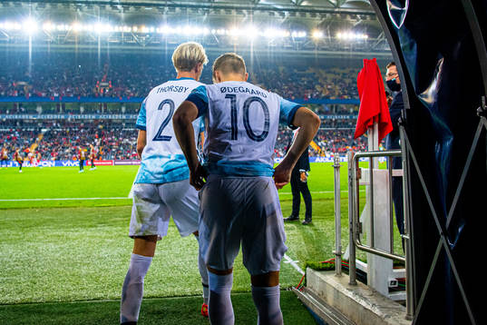 Morten Thorsby and Martin Ødegaard of Norway at half-time