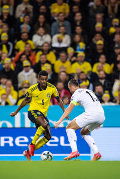 Alexander Isak of Sweden and Amir Rrahmani of Kosovo