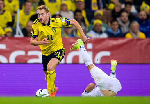 Dejan Kulusevski of Sweden and Fidan Aliti of Kosovo