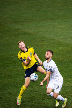 Dejan Kulusevski of Sweden and Fidan Aliti of Kosovo