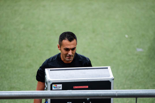 referee Marco Di Bello at the VAR screen