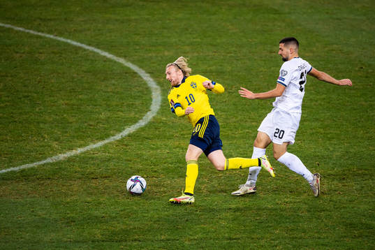 Emil Forsberg of Sweden and Ibrahim Dresevic of Kosovo