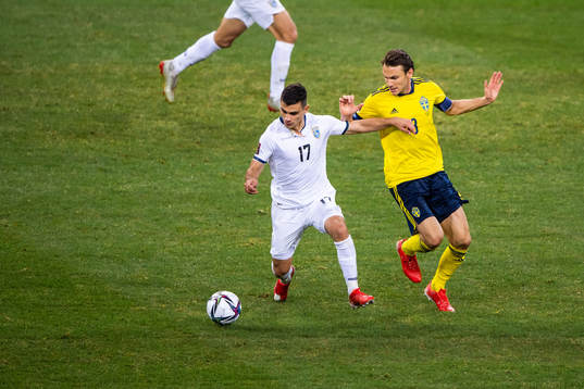 Florian Loshaj of Kosovo and Albin Ekdal of Sweden