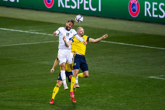 Vedat Muriqi of Kosovo and Marcus Danielson of Sweden