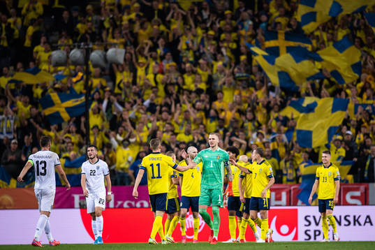 Viktor Gyökeres and goalkeeper Robin Olsen of Sweden
