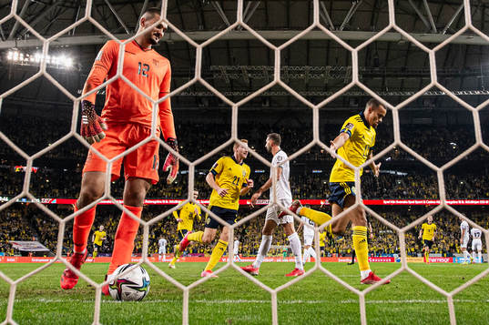 Dejan Kulusevski and Robin Quaison of Sweden celebrate