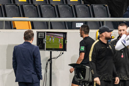 Reree Marco Di Bello awaiting a possible penalty video