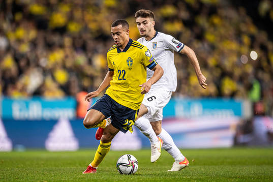 Robin Quaison of Sweden and Betim Fazliji of Kosovo
