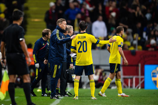 assistant coach Peter Wettergren and Kristoffer Olsson of