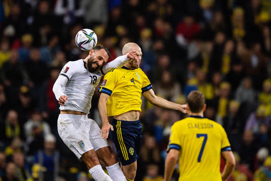 Vedat Muriqi of Kosovo and Marcus Danielson of Sweden