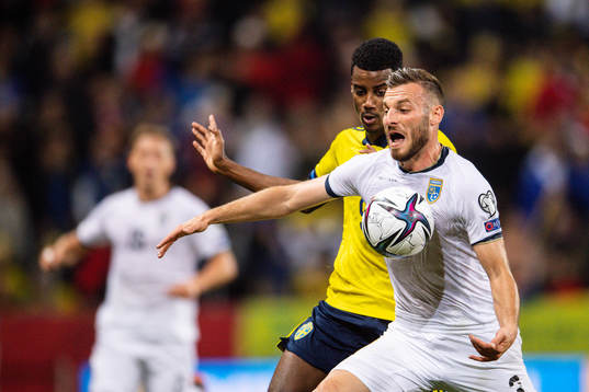 Alexander Isak of Sweden and Fidan Aliti of Kosovo