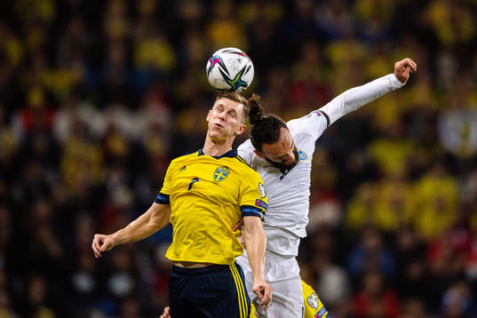 Emil Krafth of Sweden and Vedat Muriqi of Kosovo