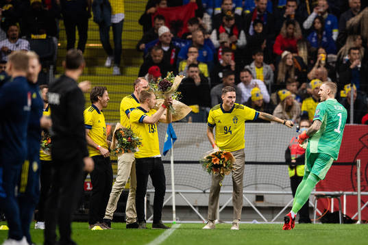 goalkeeper Robin Olsen with former players Sebastian