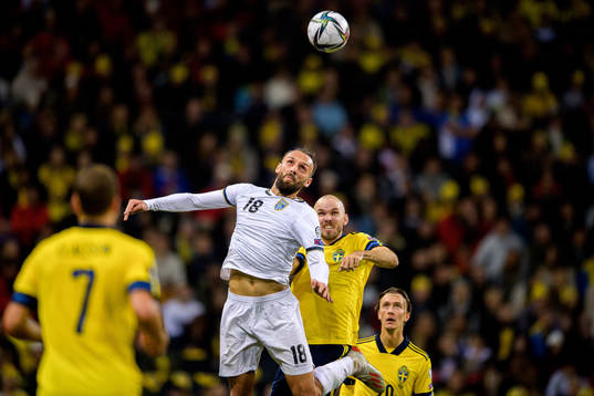 Vedat Muriqi of Kosovo and Marcus Danielson of Sweden