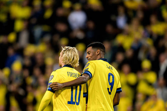 Emil Forsberg and Alexander Isak of Sweden celebrate the