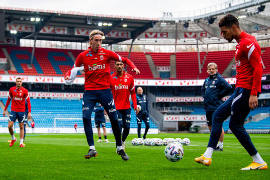 Dennis Johnsen and Ohi Omoijuanfo of the Norwegian national
