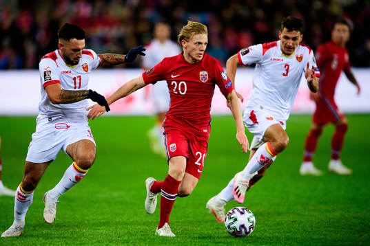 Sead Haksabanovic and Risto Radunovic of Montenegro against