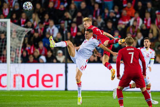 Adam Marusic of Montenegro and Andreas Hanche-Olsen of