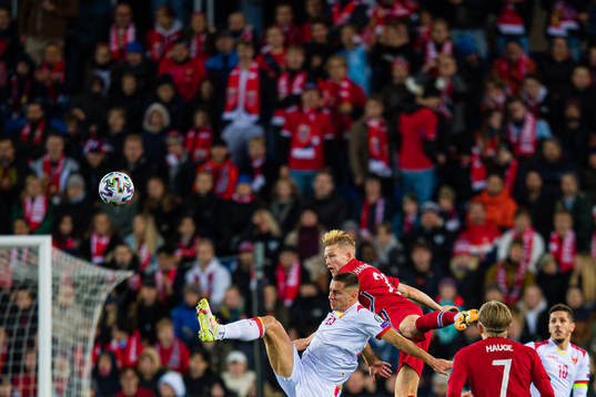 Adam Marusic of Montenegro and Andreas Hanche-Olsen of