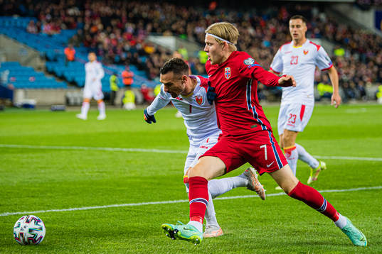 Marko Vesovic of Montenegro and Jens Petter Hauge of Norway