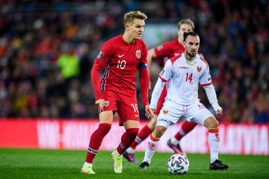Martin Ødegaard of Norway and Marko Jankovic of Montenegro