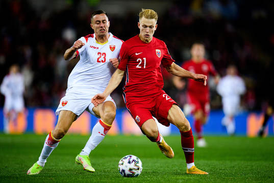 Adam Marusic of Montenegro and Andreas Hanche-Olsen of