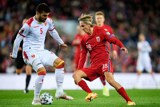Igor Vujacic of Montenegro and Dennis Johnsen of Norway