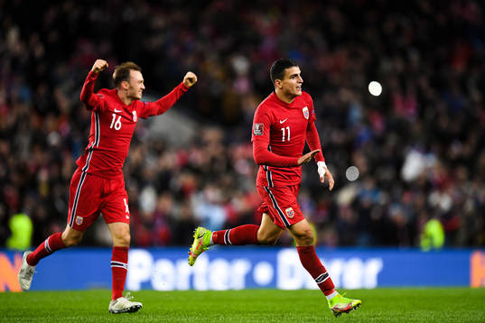Fredrik Aursnes and Mohamed Elyounoussi of Norway celebrate
