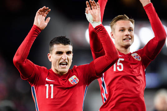 Mohamed Elyounoussi and Stian Gregersen of Norway celebrate