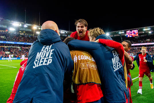 Stefan Strandberg of Norway celebrates with staff and
